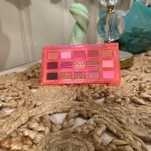 Revolution eyeshadow palette in pretty neon pink case